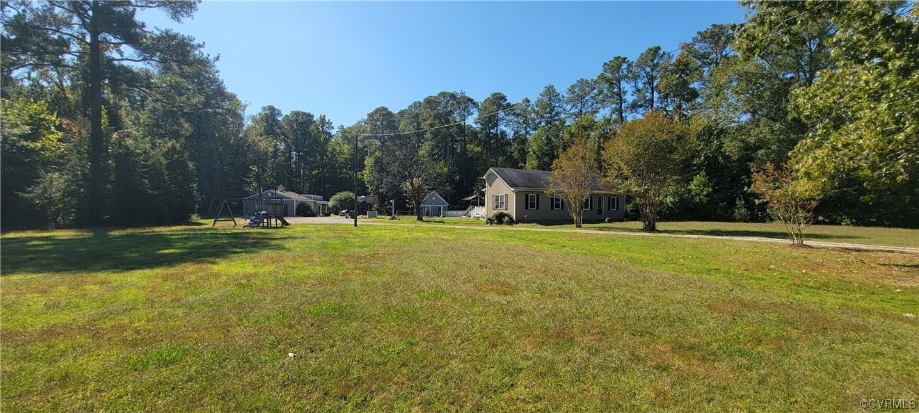 3502 Goodwin Neck Road Yorktown, VA 23692 - Photo 2 of 23 a view of a house with a big yard
