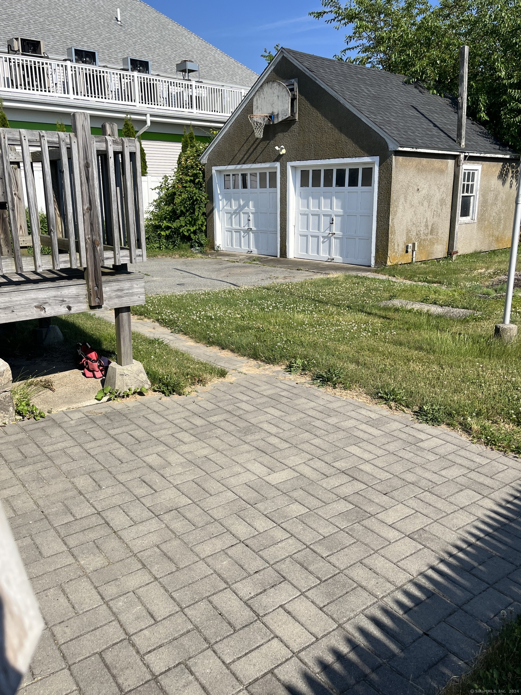 83 Ledyard Avenue Groton, CT 06340 - Photo 12 of 15 a front view of a house with a yard and garage