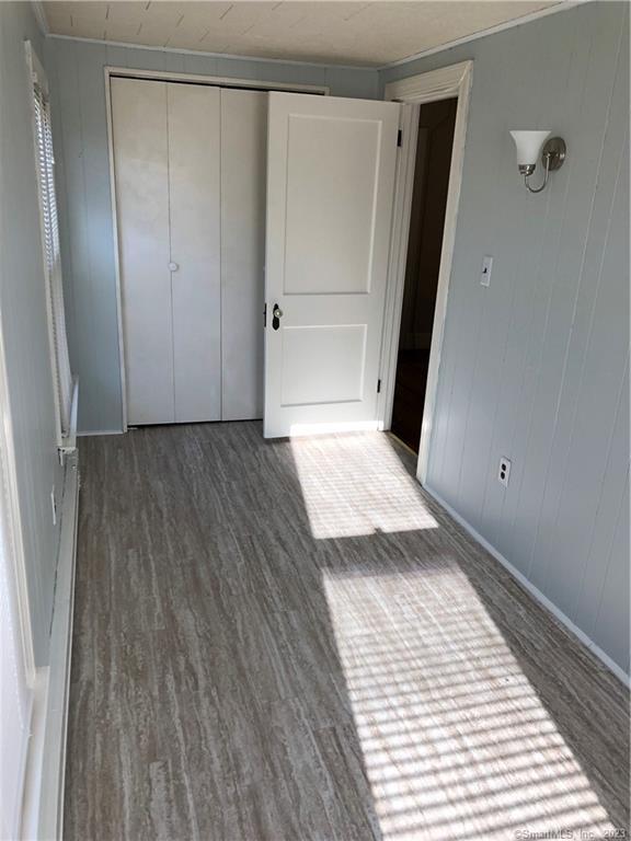 83 Ledyard Avenue Groton, CT 06340 - Photo 6 of 15 a view of wooden floor