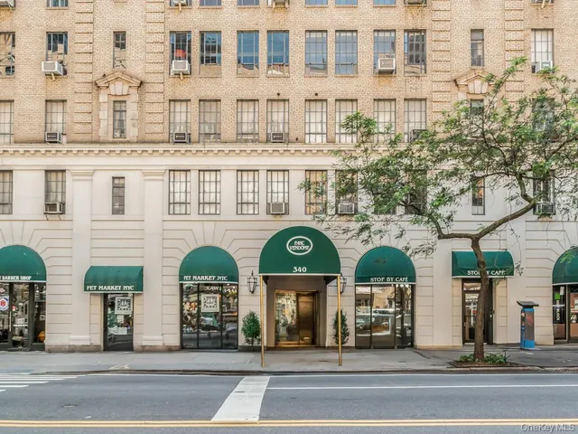 a front view of multi story residential apartment building