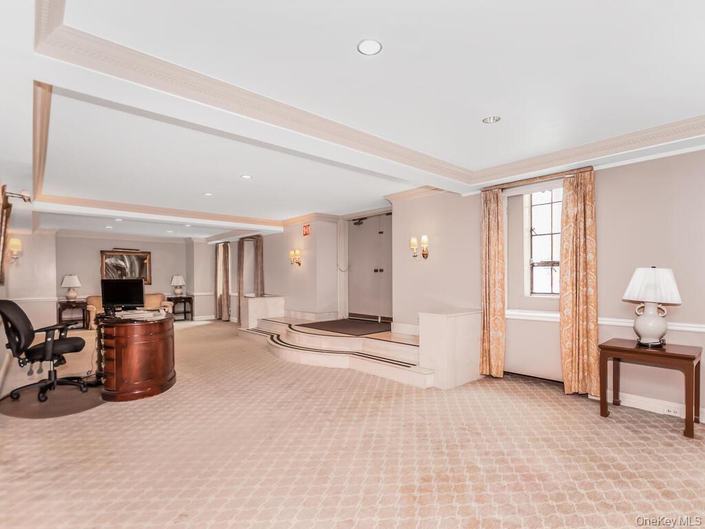 340 West 57th Street, Unit 5F Manhattan, NY 10019 - Photo 20 of 24 a large white room with furniture