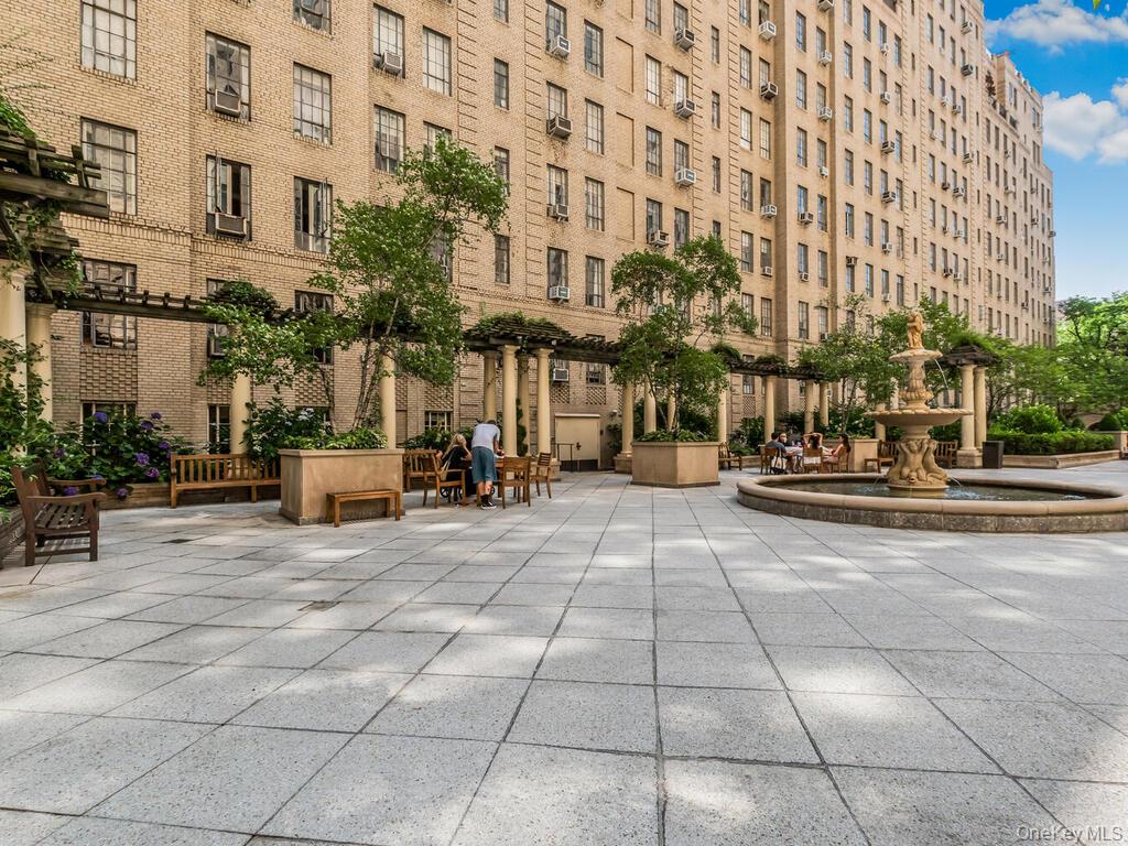 340 West 57th Street, Unit 5F Manhattan, NY 10019 - Photo 22 of 24 a view of a building with sitting area