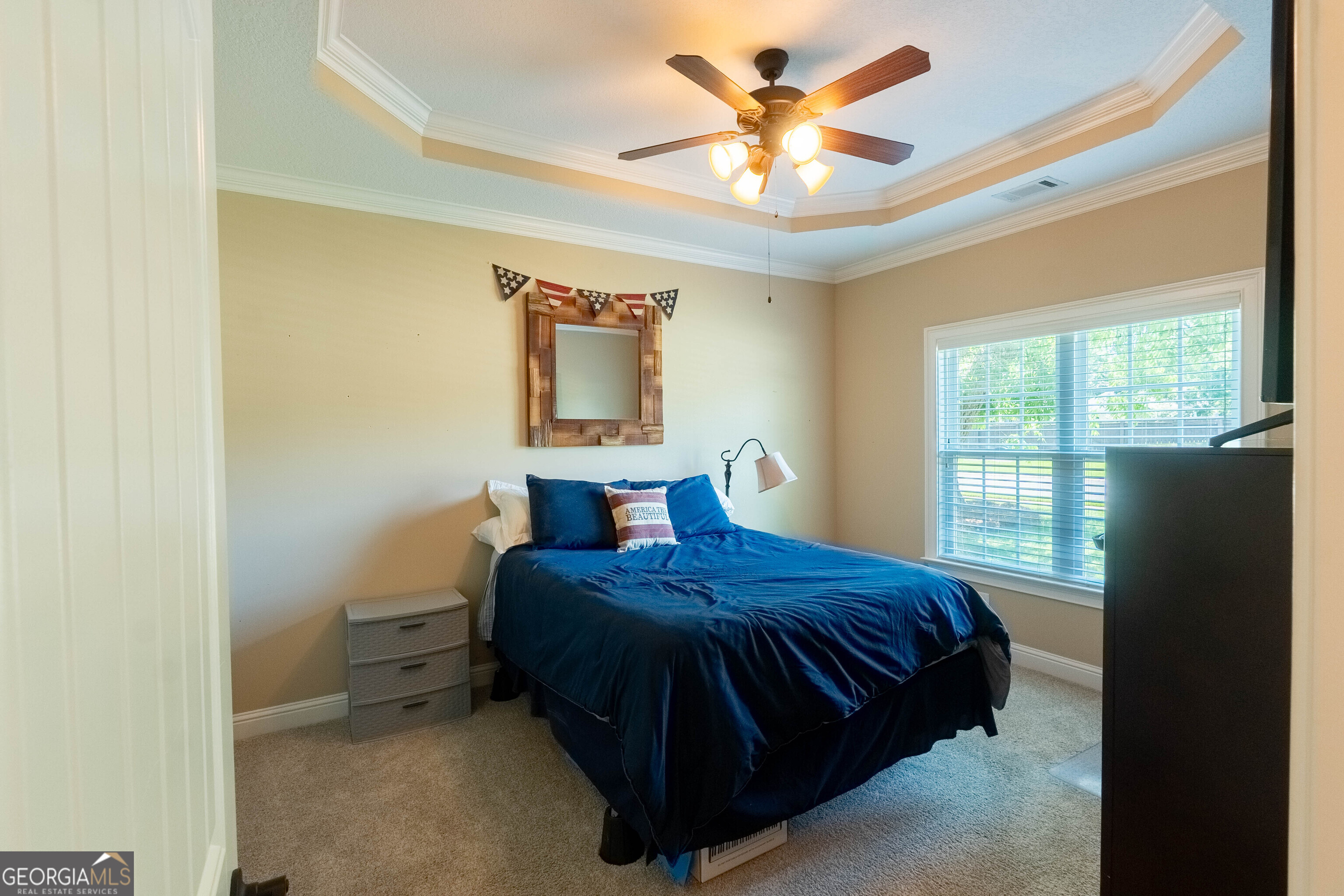 501 Old Bridge Road Warner Robins, GA 31088 - Photo 28 of 54 a bedroom with a bed and a window