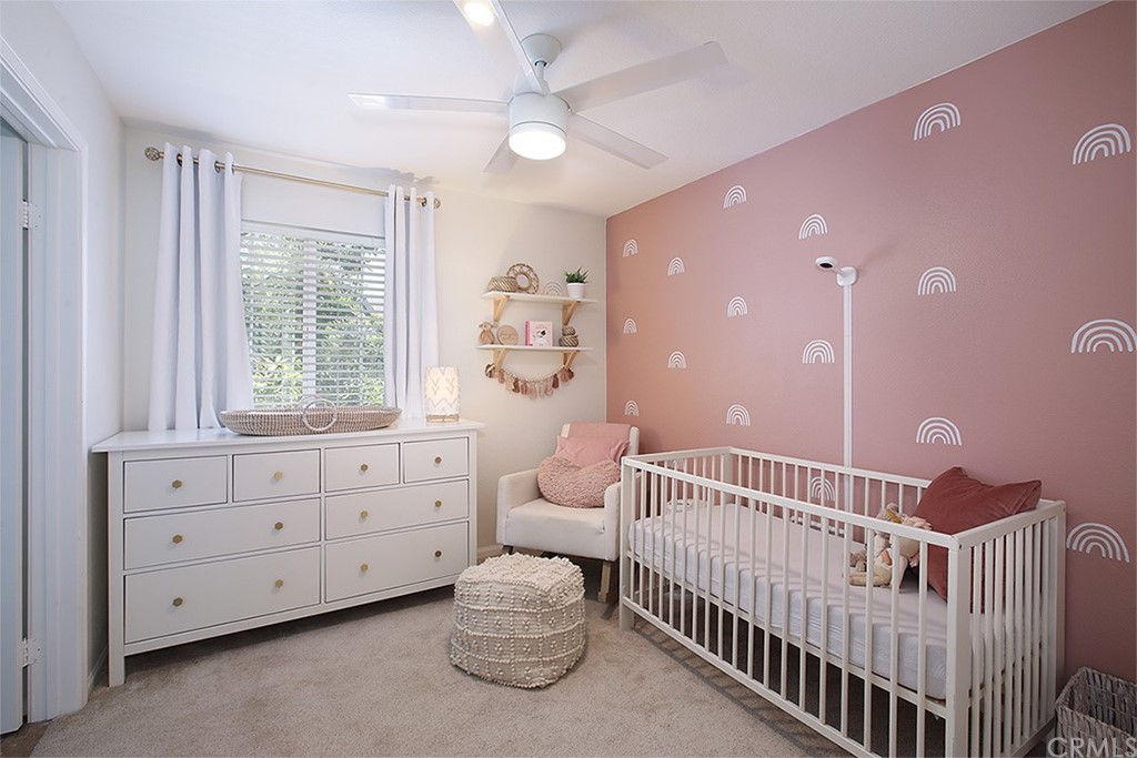 52 Palladium Lane, Unit 82 Ladera Ranch, CA 92694 - Photo 11 of 20 a bedroom with furniture and a window