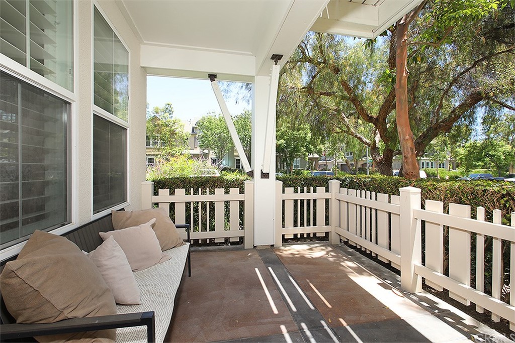 52 Palladium Lane, Unit 82 Ladera Ranch, CA 92694 - Photo 13 of 20 a balcony with wooden floor