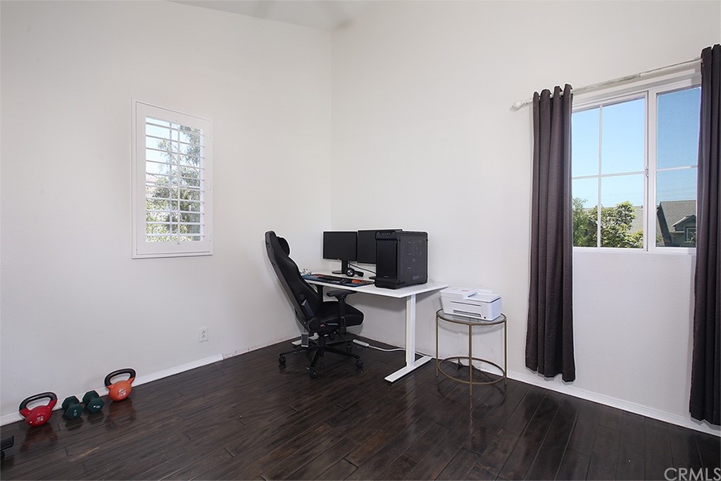 52 Palladium Lane, Unit 82 Ladera Ranch, CA 92694 - Photo 14 of 20 a workspace with furniture and window