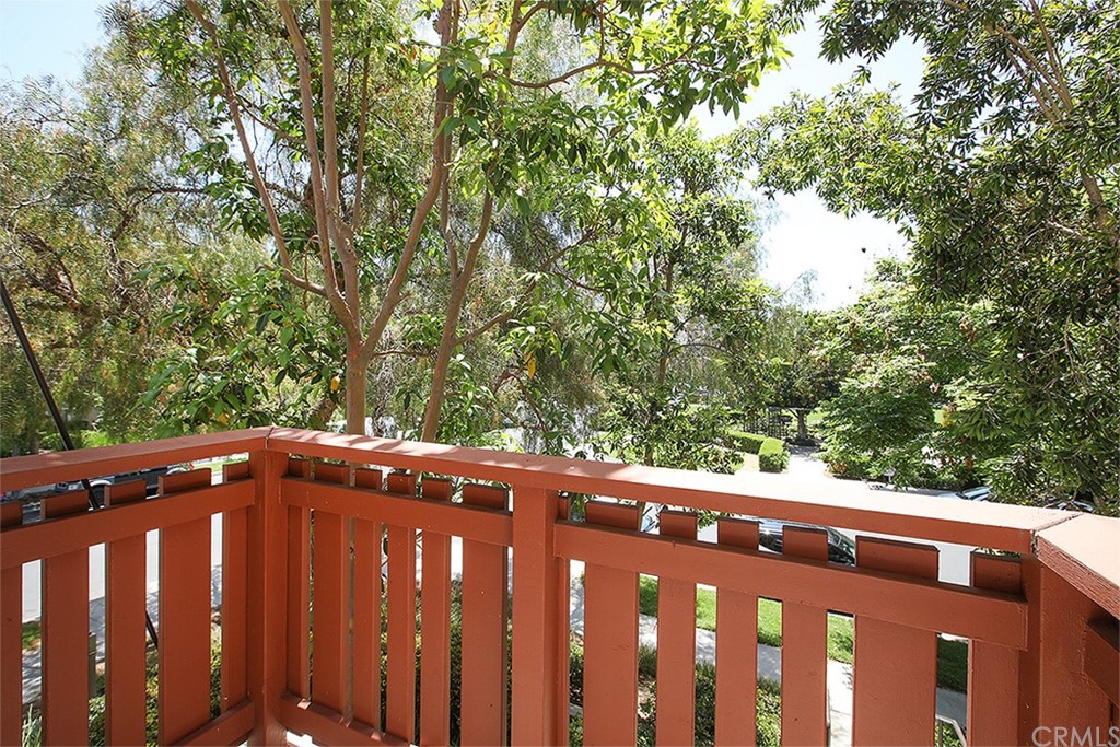 52 Palladium Lane, Unit 82 Ladera Ranch, CA 92694 - Photo 15 of 20 a view of a wooden fence