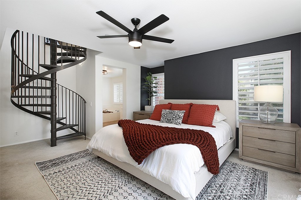 52 Palladium Lane, Unit 82 Ladera Ranch, CA 92694 - Photo 8 of 20 a bedroom with a bed and a window