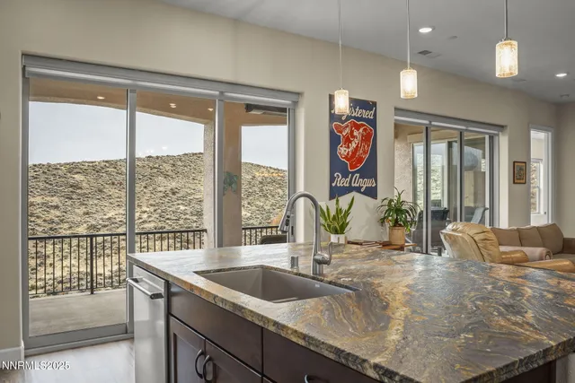 a spacious bedroom with a large bed and a large window