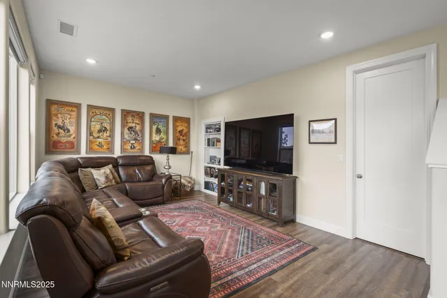 a view of a house with backyard porch and sitting area