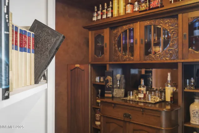 a view of a chairs and table in patio