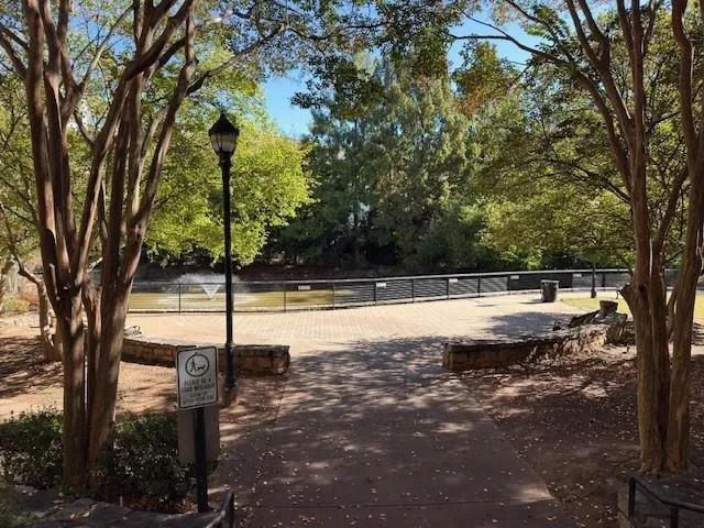 a view of swimming pool with a yard