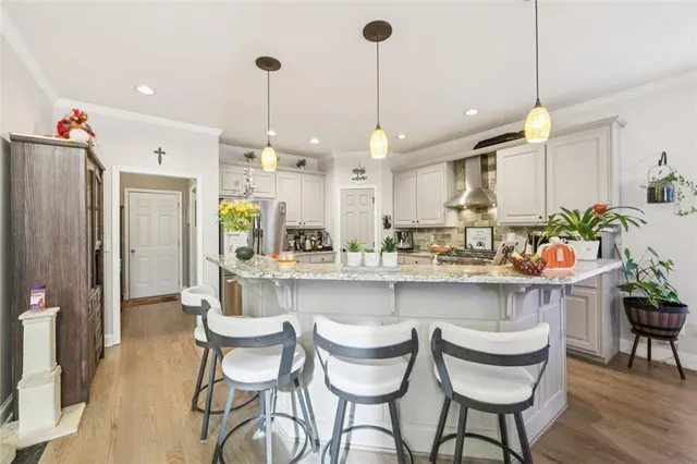a bathroom with a sink mirror and toilet