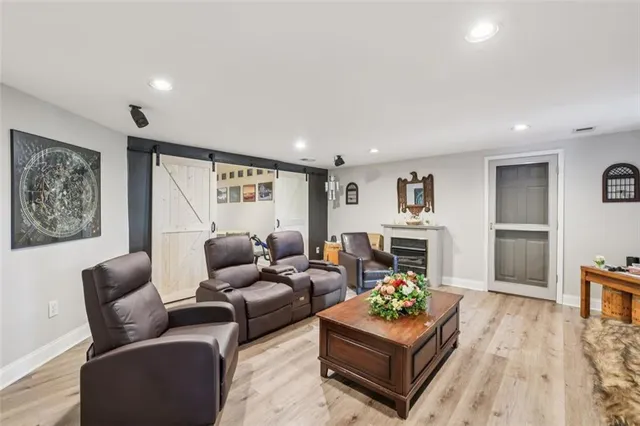 an aerial view of a house with a lake view