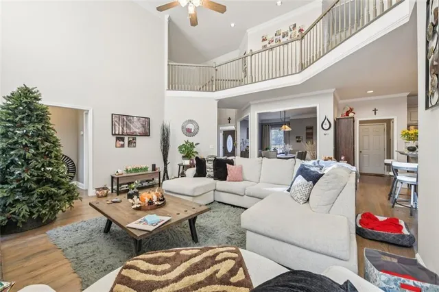 a view of a dining room with furniture and window