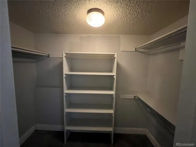 a storage room with washer and dryer