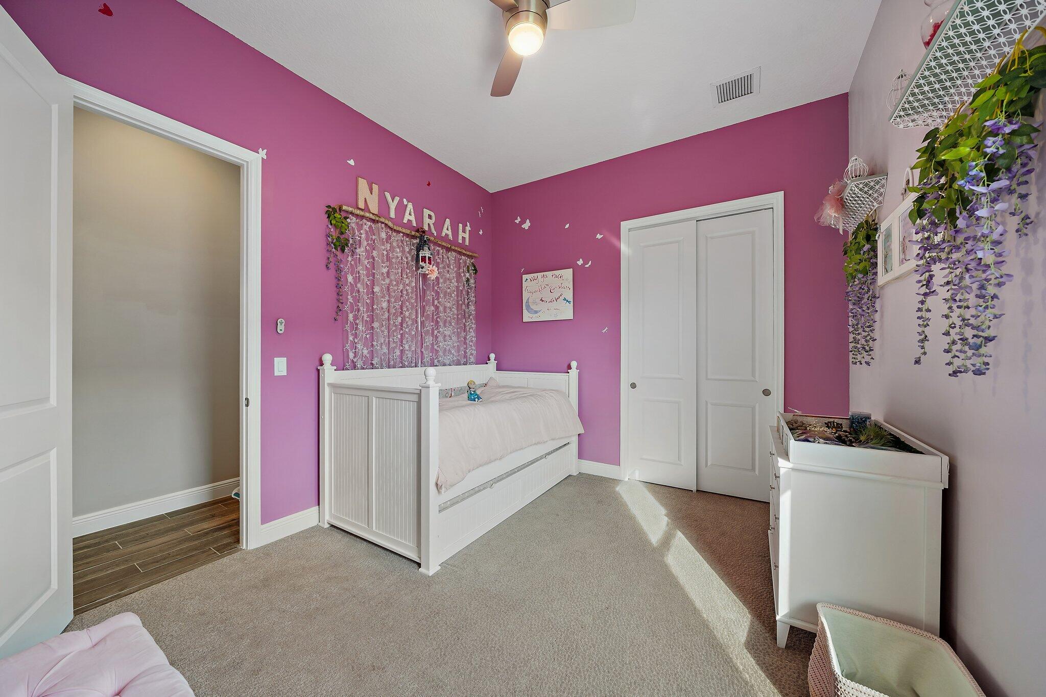 19540 Wheelbarrow Bend Loxahatchee, FL 33470 - Photo 24 of 54 a spacious bathroom with a bathtub sink and mirror