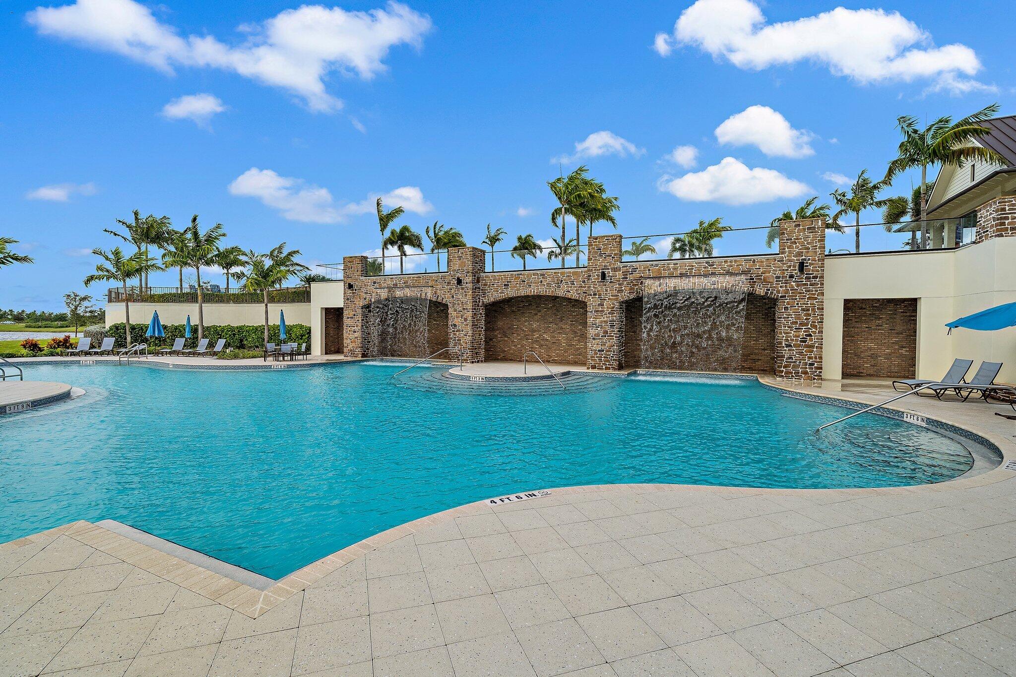 19540 Wheelbarrow Bend Loxahatchee, FL 33470 - Photo 48 of 54 a view of a house with a swimming pool