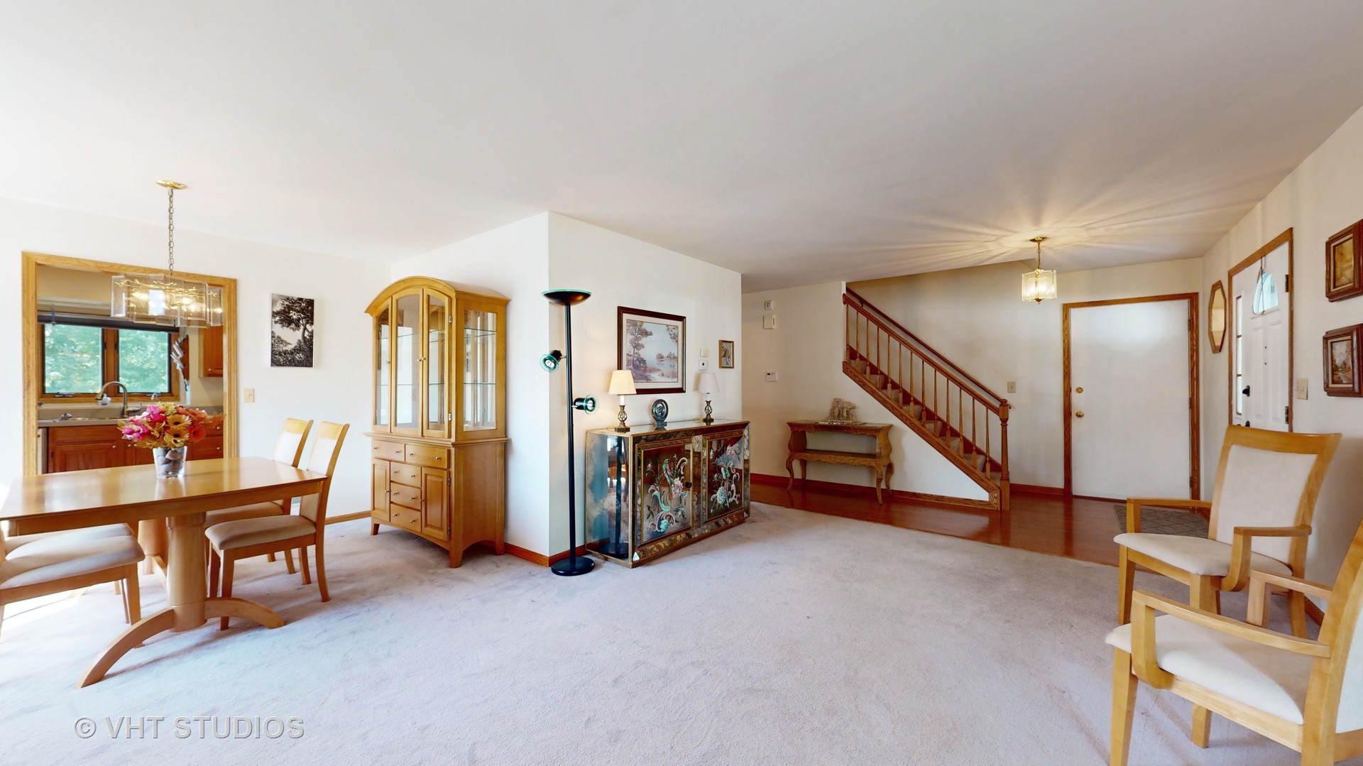 103 Crystal Lake Road Lake In The Hills, IL 60156 - Photo 14 of 42 a view of an empty room with furniture and stairs