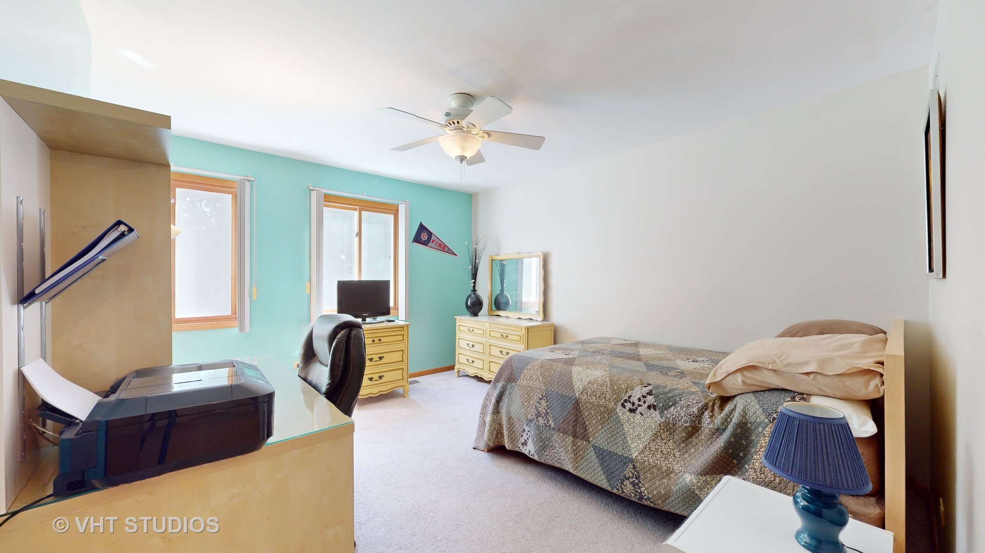 103 Crystal Lake Road Lake In The Hills, IL 60156 - Photo 24 of 42 a bedroom with a bed and wooden floor