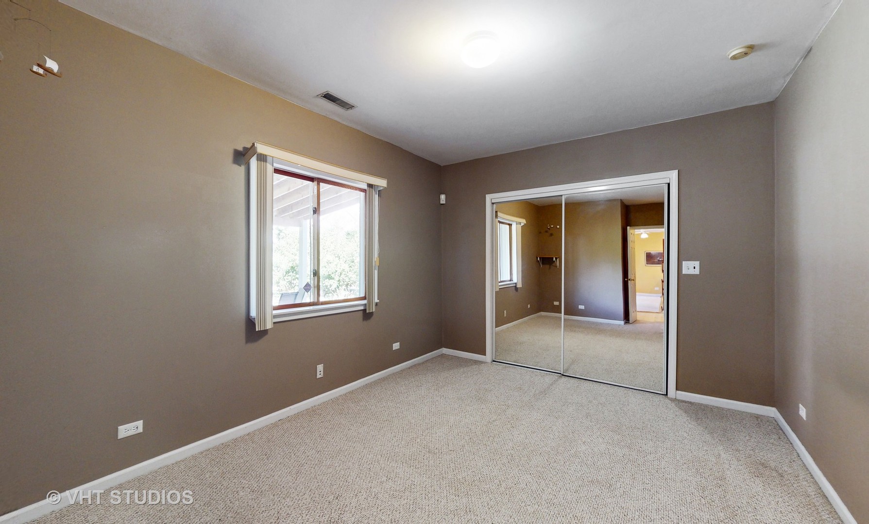 103 Crystal Lake Road Lake In The Hills, IL 60156 - Photo 29 of 42 an empty room with windows and closet