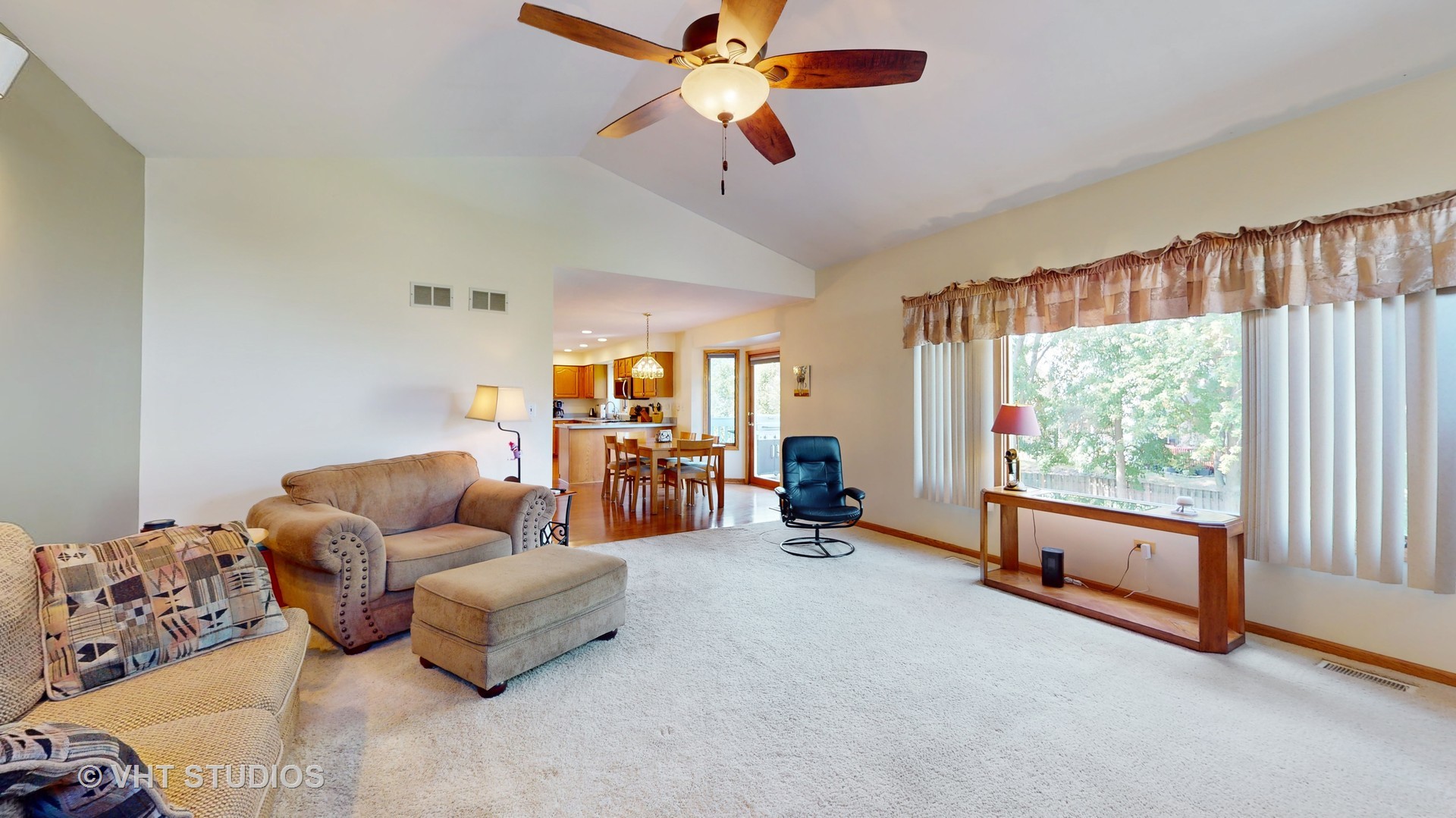 103 Crystal Lake Road Lake In The Hills, IL 60156 - Photo 5 of 42 a living room with furniture and a large window