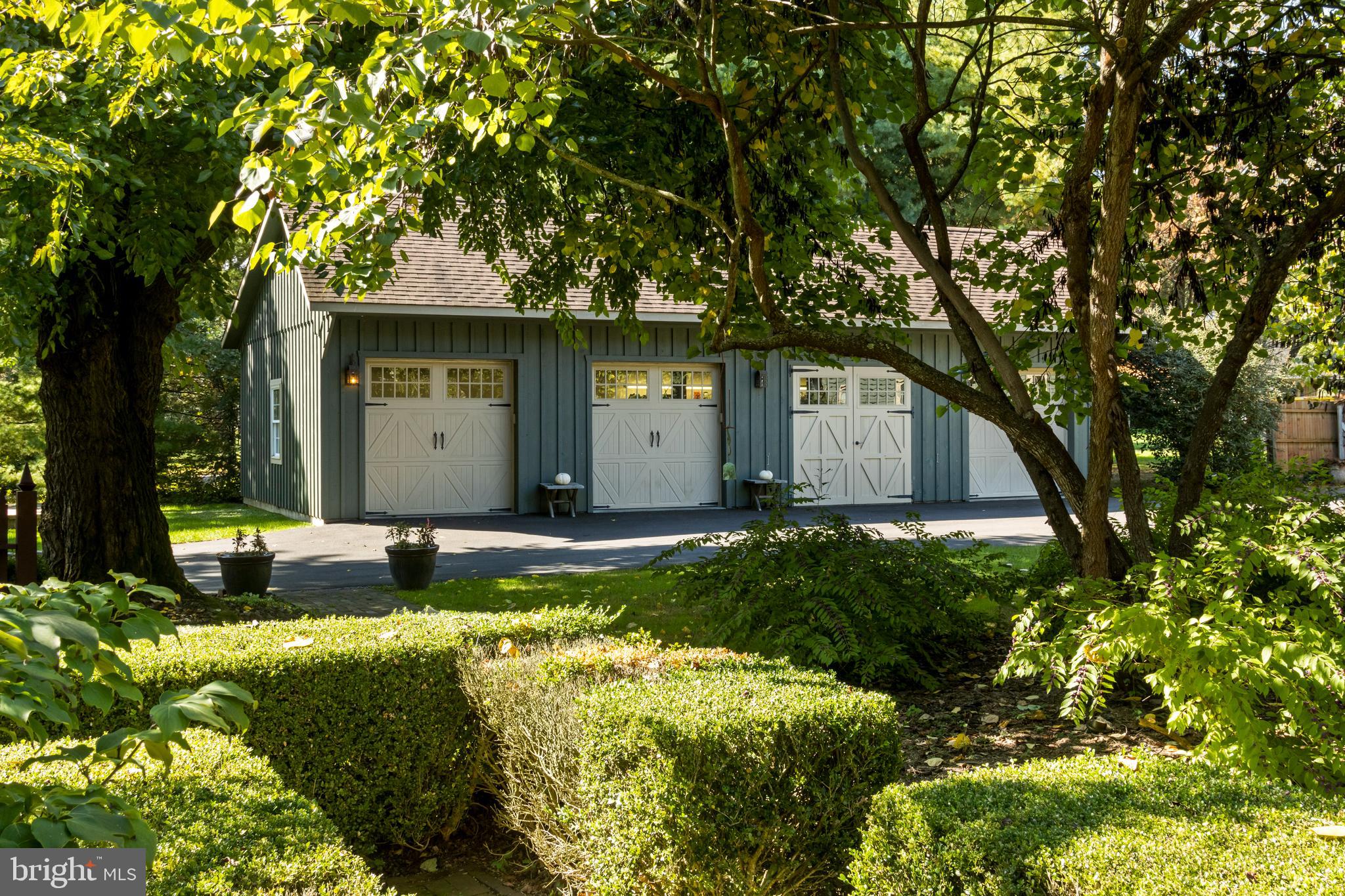 3296 Lower Mountain Road Furlong, PA 18925 - Photo 4 of 43 4-Car oversized Garage with lift and workshop