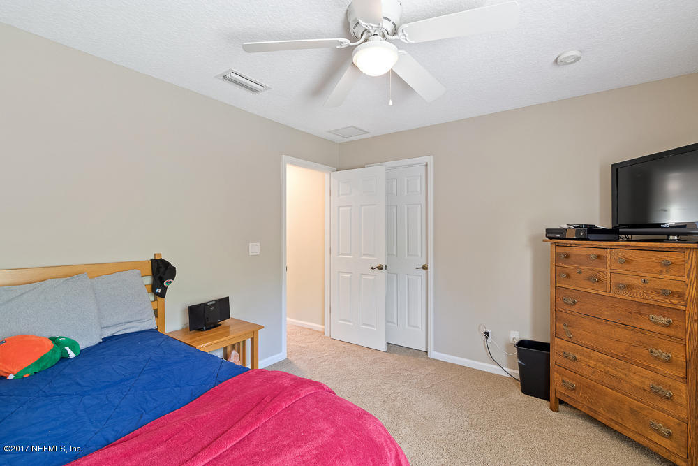 3151 East Banister Road St. Augustine, FL 32092 - Photo 27 of 34 Ceiling Fan and Carpet Floor