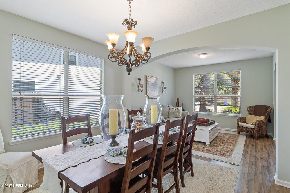 3151 East Banister Road St. Augustine, FL 32092 - Photo 6 of 34 Large Windows and Chandelier