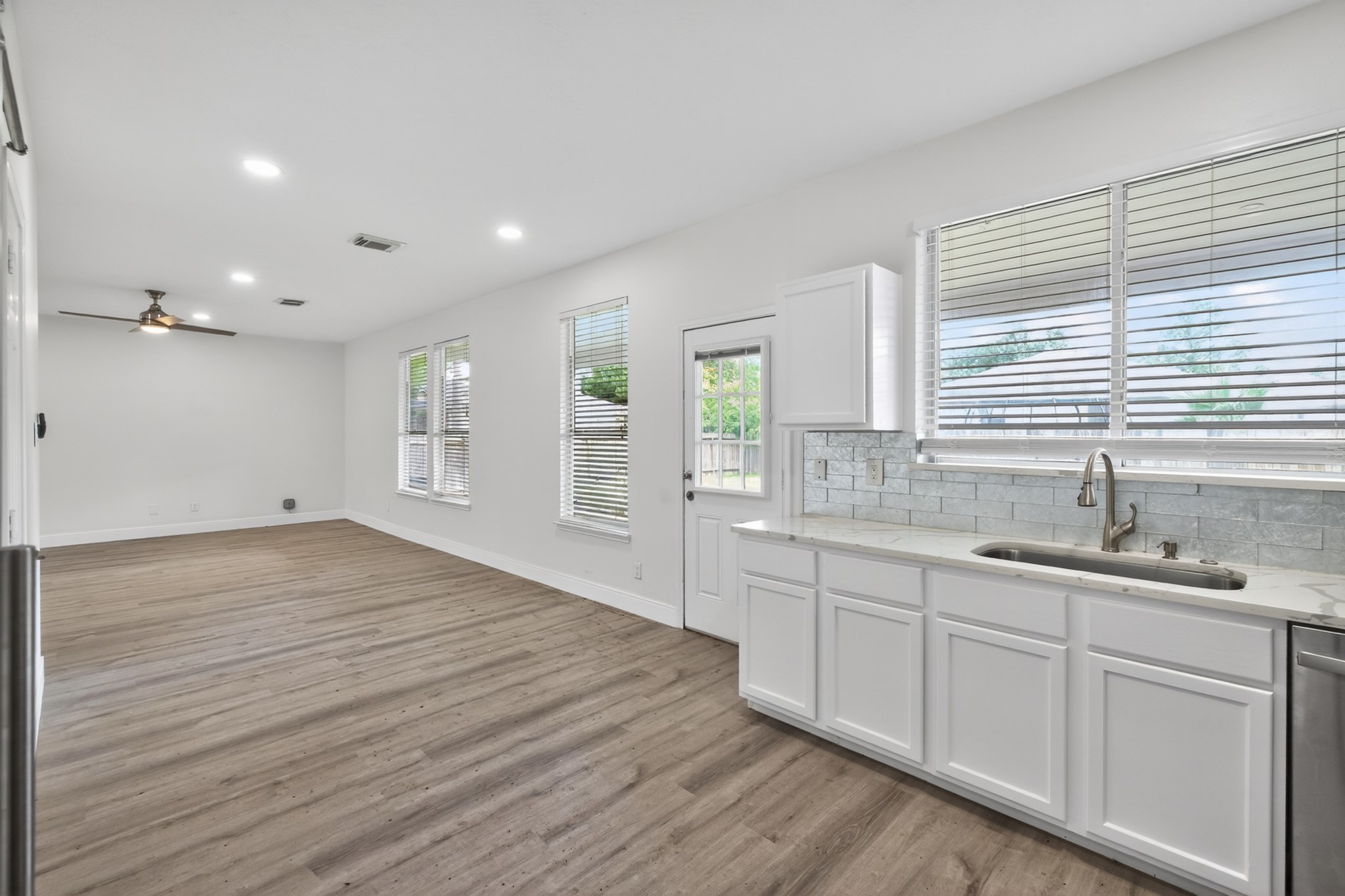918 Ivycroft Lane Spring, TX 77373 - Photo 14 of 33 a bathroom with a sink double vanity and a window