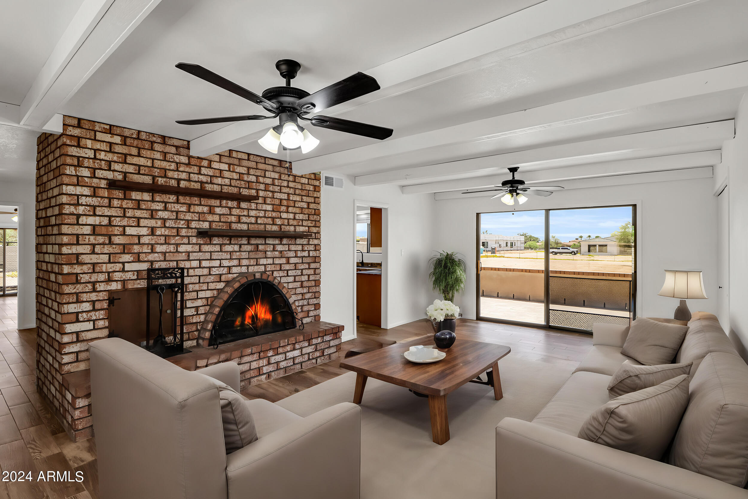 6715 East Peak View Road Cave Creek, AZ 85331 - Photo 12 of 23 Family Room Virtual Staging