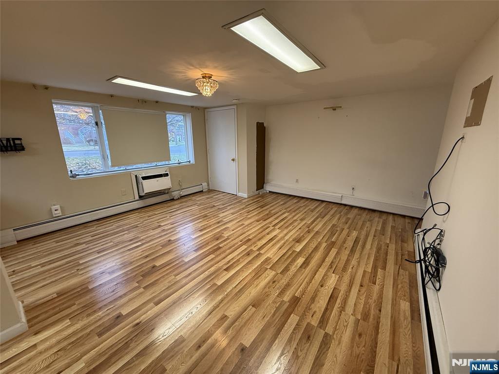 2 Millo Place, Unit 1 Little Ferry, NJ 07643 - Photo 4 of 8 a view of a room with wooden floor
