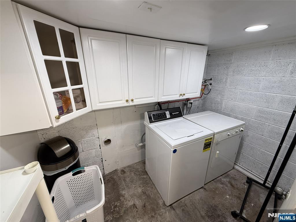 2 Millo Place, Unit 1 Little Ferry, NJ 07643 - Photo 8 of 8 a utility room with dryer and washer