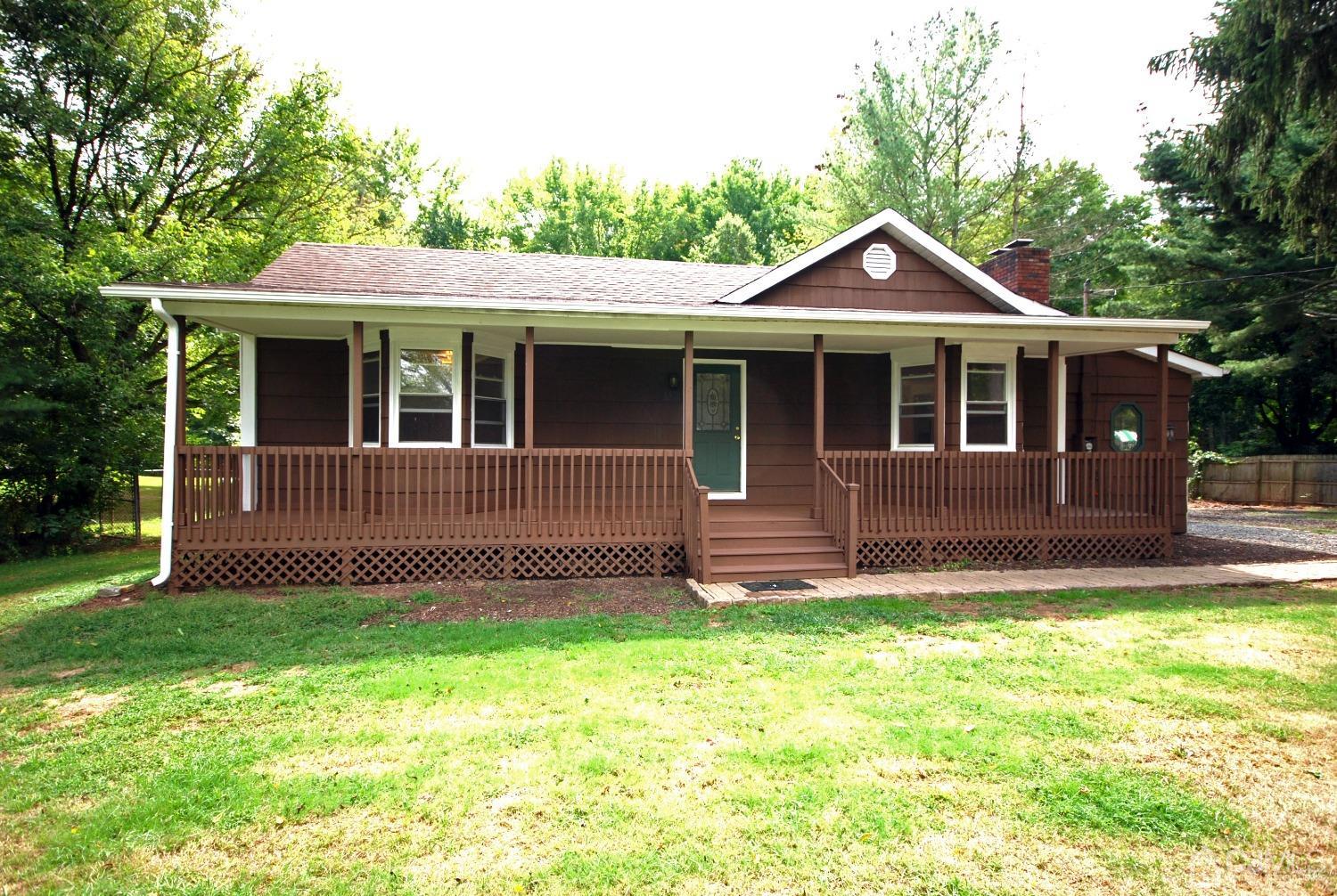 82 Red Valley Road Millstone Township, NJ 08510 - Photo 3 of 26 a front view of a house with a yard