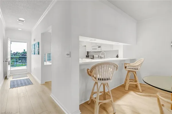 a room with furniture and wooden floor