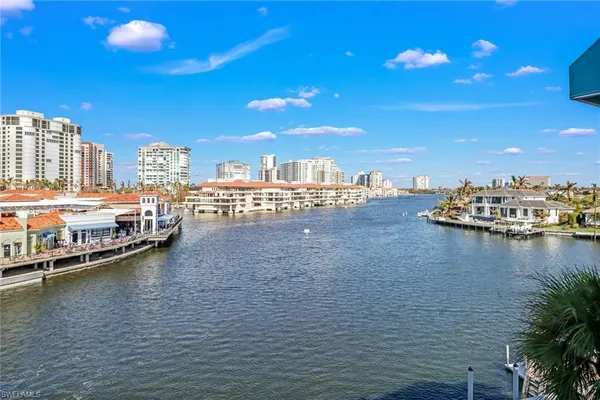 a view of a city with large trees