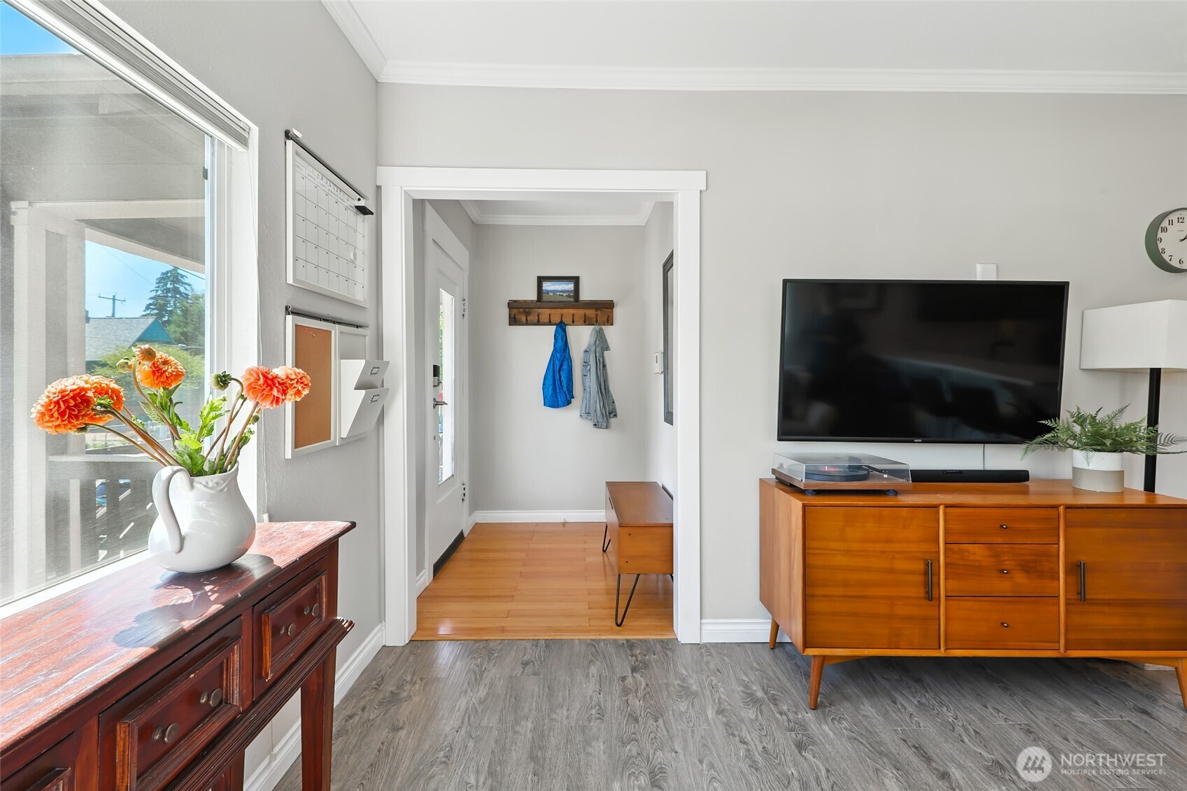 4616 South Orcas Street Seattle, WA 98118 - Photo 2 of 37 a living room with furniture and a flat screen tv