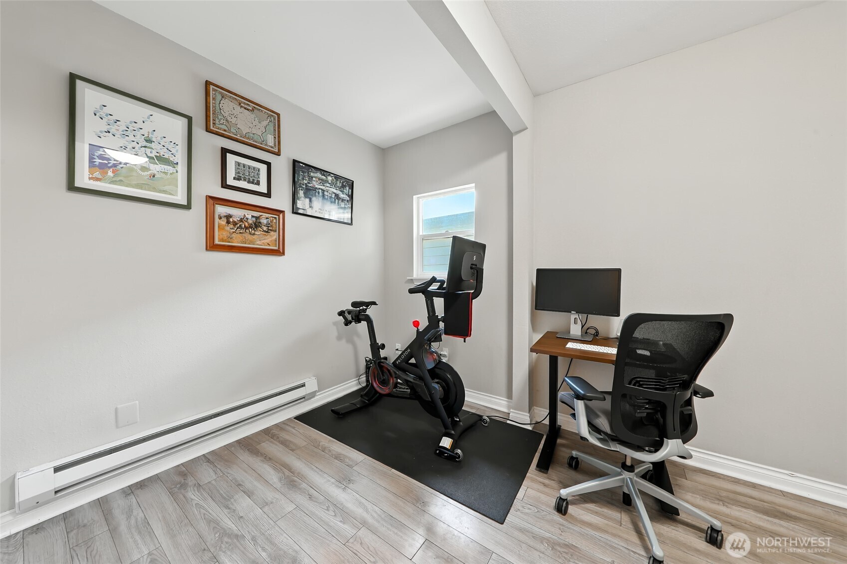 4616 South Orcas Street Seattle, WA 98118 - Photo 21 of 37 a view of a workspace with furniture and a window
