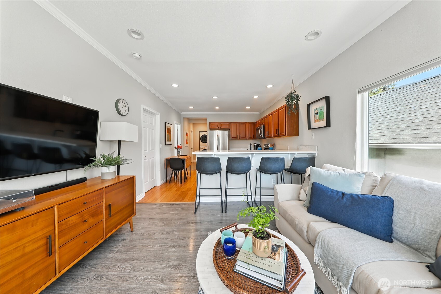 4616 South Orcas Street Seattle, WA 98118 - Photo 3 of 37 a living room with furniture and a flat screen tv