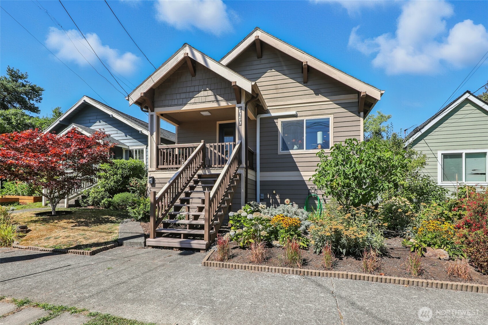 4616 South Orcas Street Seattle, WA 98118 - Photo 37 of 37 a front view of a house with a yard