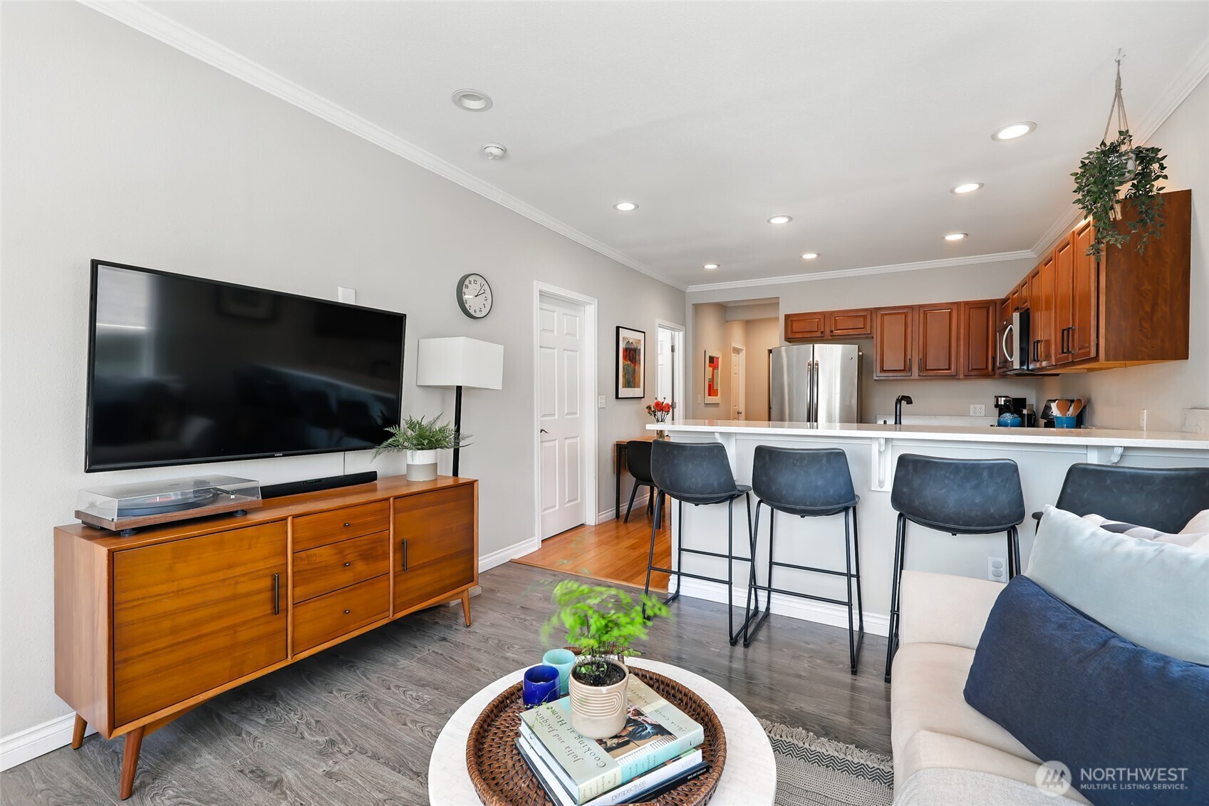 4616 South Orcas Street Seattle, WA 98118 - Photo 5 of 37 a living room with furniture and a flat screen tv