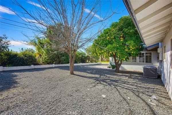 a view of backyard with green space