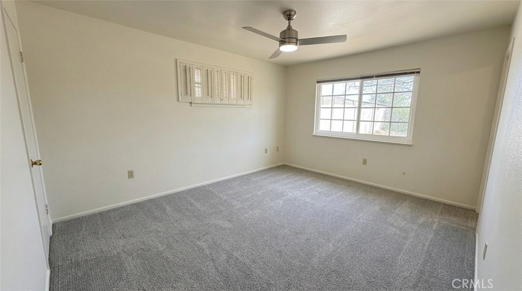 27077 El Rancho Drive Menifee, CA 92586 - Photo 7 of 11 a view of an empty room with a window
