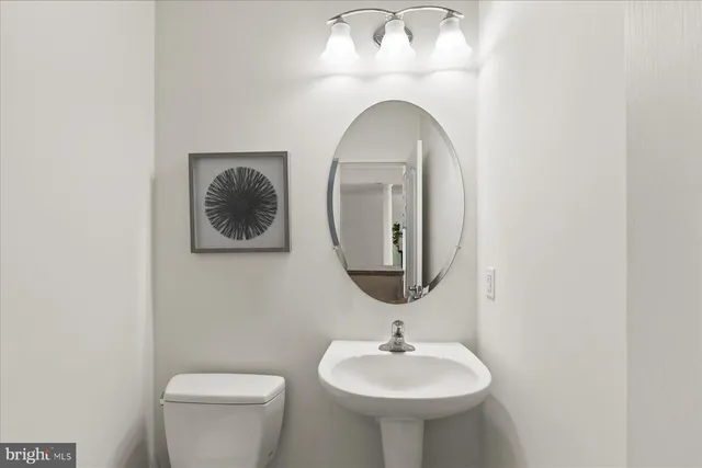 a spacious bedroom with a bed and a window