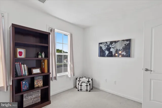 a view of a workspace with furniture