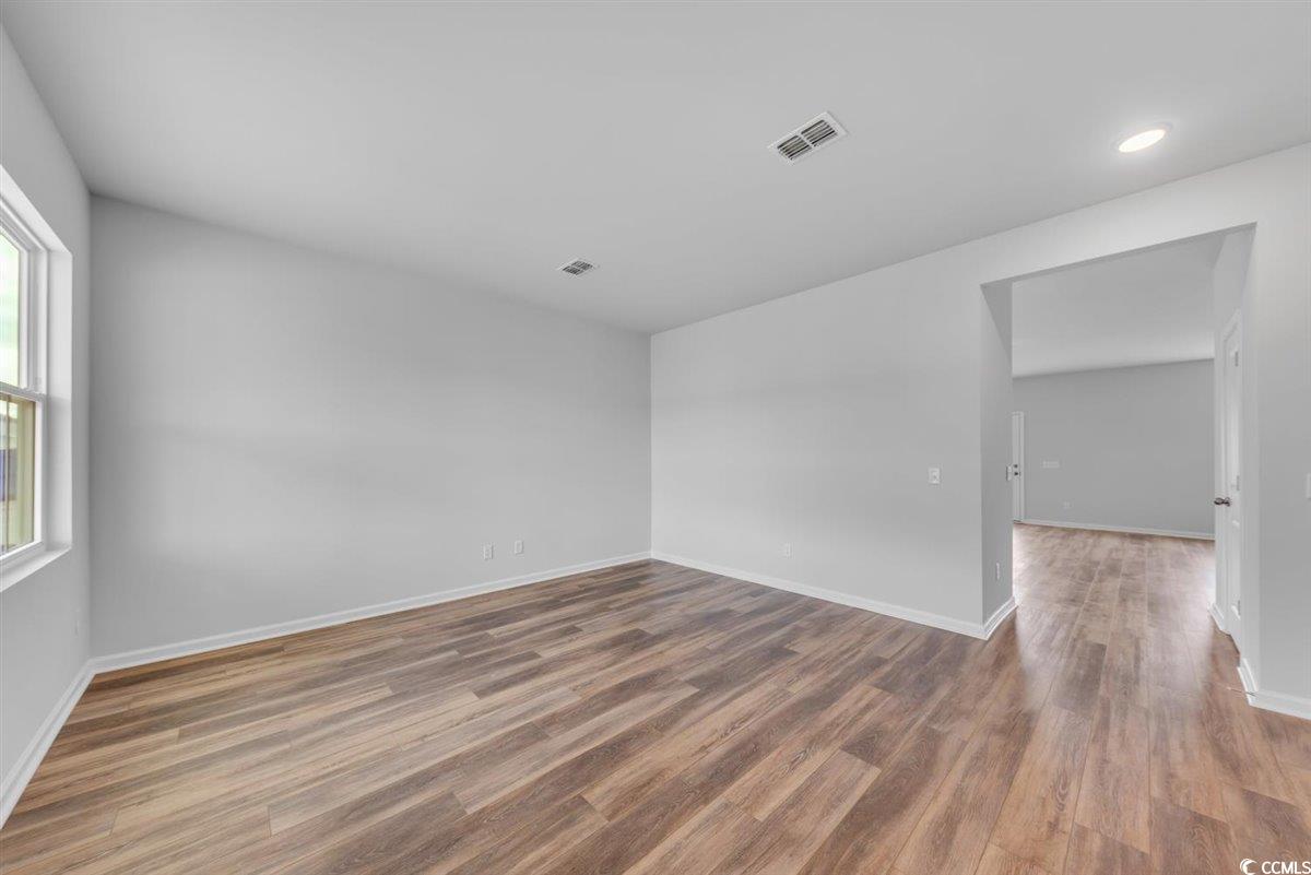 997 Laconic Drive Myrtle Beach, SC 29588 - Photo 3 of 22 Empty room with baseboards, visible vents, recesse
