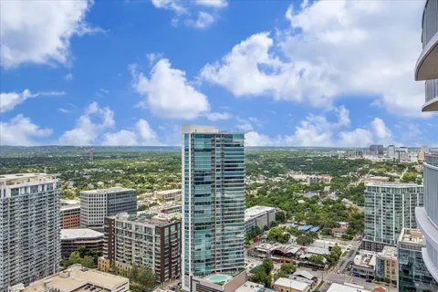 a view of a city with tall buildings