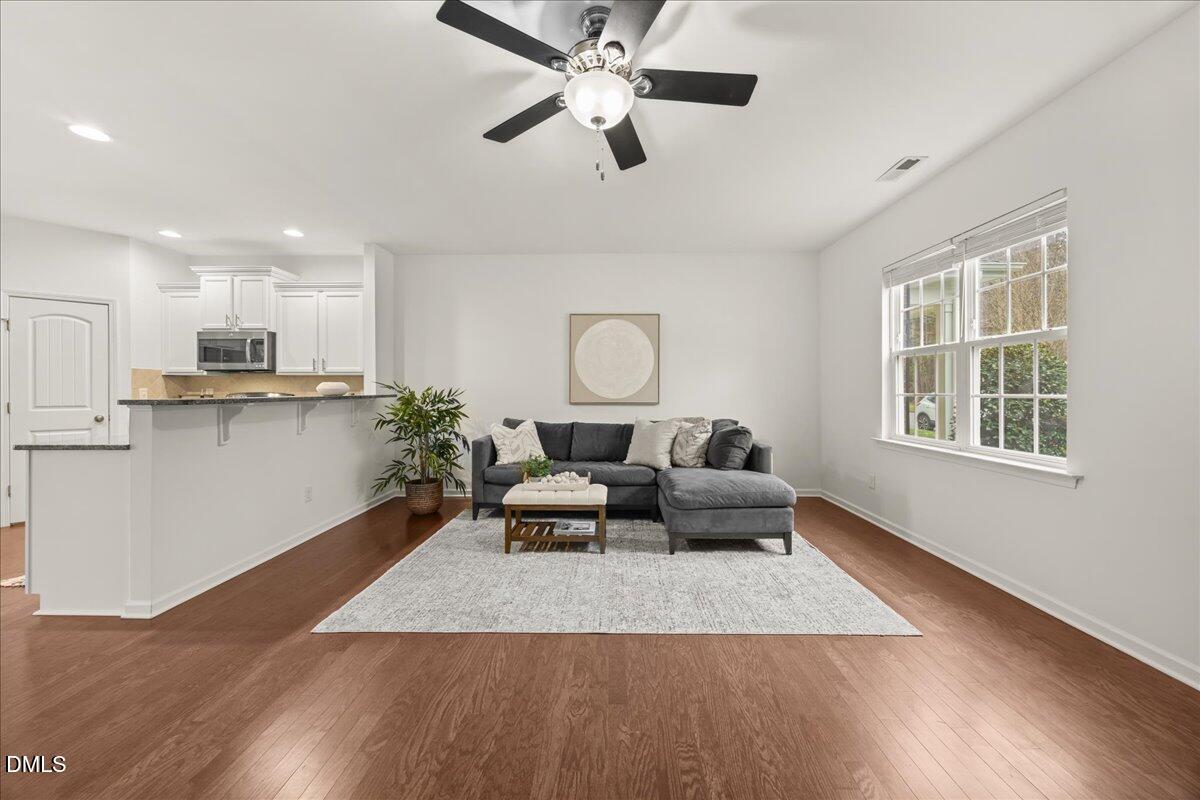 1003 Ileagnes Road Raleigh, NC 27603 - Photo 10 of 42 a living room with furniture and a window