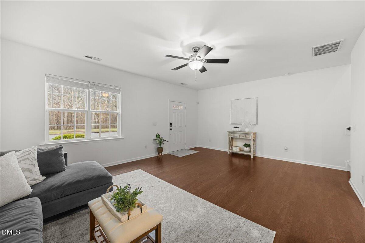 1003 Ileagnes Road Raleigh, NC 27603 - Photo 11 of 42 a living room with furniture and a window