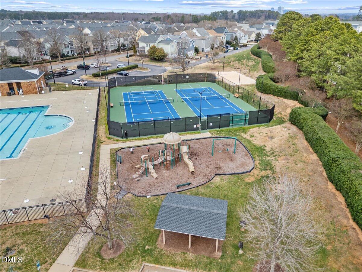 1003 Ileagnes Road Raleigh, NC 27603 - Photo 36 of 42 an aerial view of a house with garden space and a car park